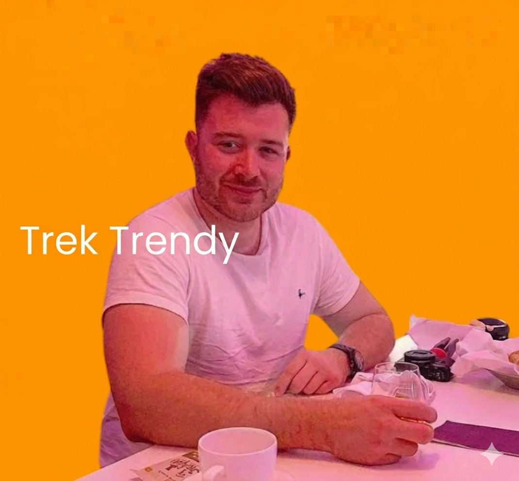 Will Davis Trek Trendy luxury travel influencer filming in premium travel cabin showing lifestyle and success